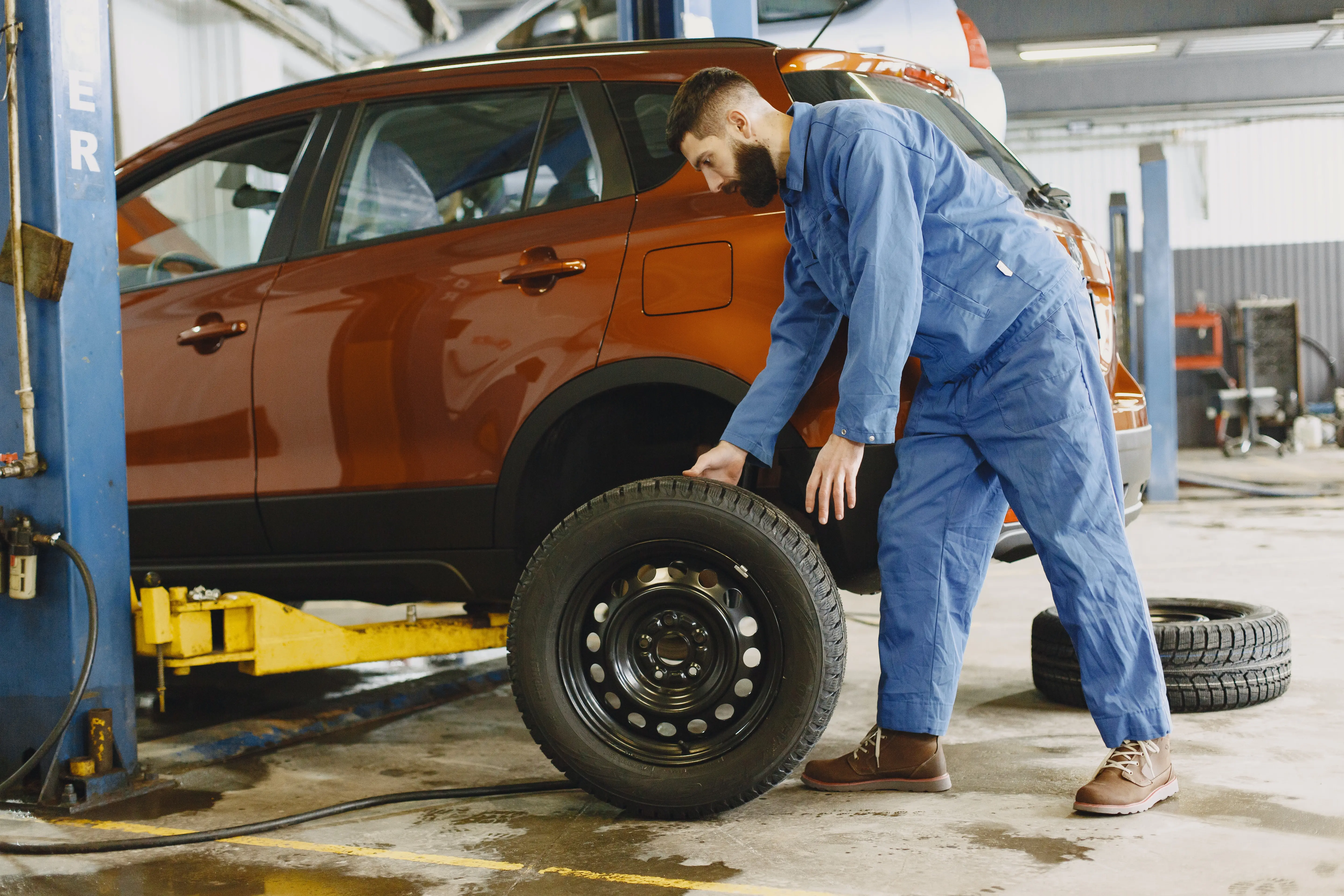 mechanic fixing a car