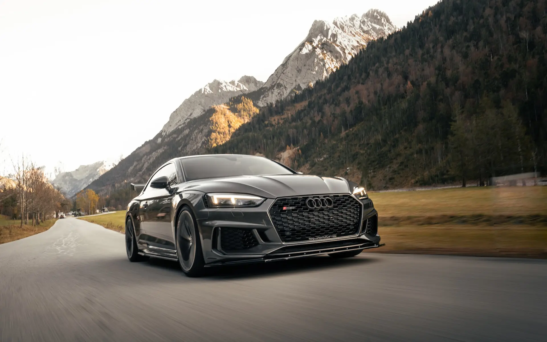 black Audi on road