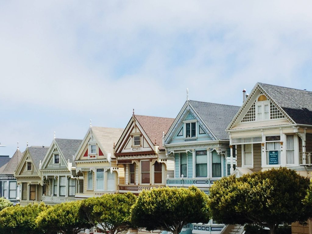 different colored houses lined up in a row